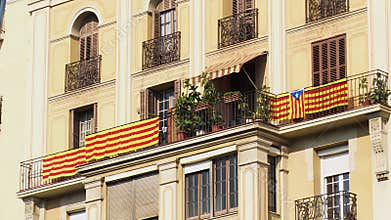 Residential House with Several Catalan Flags Hanging