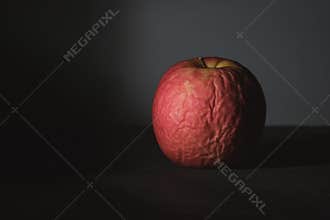 Aging of the rotten apple surface