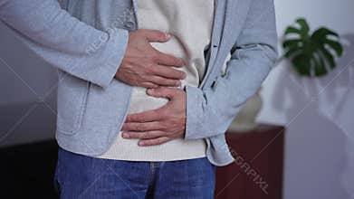 Man has a stomach ache