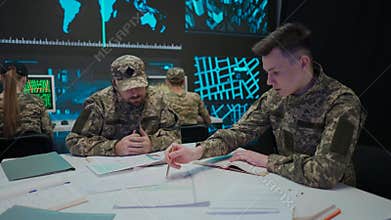 Group of security squad in control center. Military headquarters surveillance officers cyber police briefing at the