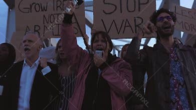 Diverse young people protesting against war and violence.