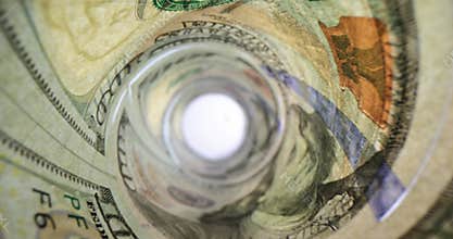 American dollar money banknotes rolled into a tube