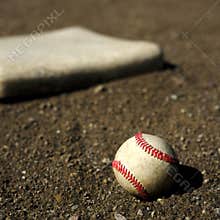 Baseball Field Home Plate with Ball and Textured Dirt of Balldiamond Diamond