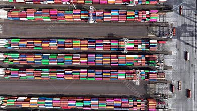 Drone shot of modern industrial container port of Rotterdam with containers from top view.