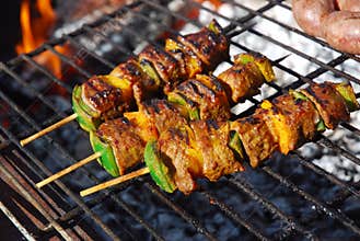 Barbecue beef kebabs on grill