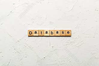 database word written on wood block. database text on table, concept