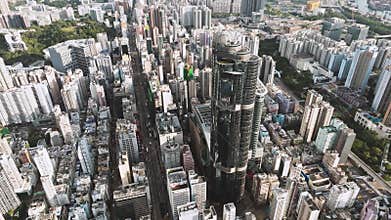 Establishing shot of Hong Kong city, drone aerial cityscape high angle view. Skyscraper in business district