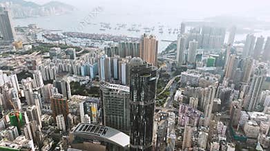 Establishing shot of Hong Kong city, drone aerial cityscape high angle view. Skyscraper in business district