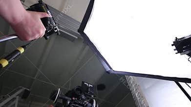 Camera and videographer and male hands moving