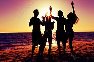 People having party at beach with drinks