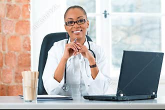 Portrait of young female doctor in clinic