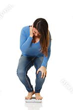 Young woman on Weight Scale
