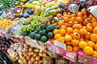 Florence, Italia, May 10, 2024: Fresh Tropical Fruits and Vegetables Market Display for Health and Nutrition Concept