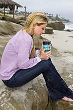 Young Woman Early Morning On The Beach