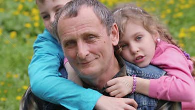 Grandchildren boy and little girl embrace their