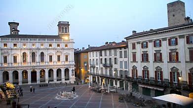 Piazza Vecchia in Bergamo. Library, fountain and historic buildings