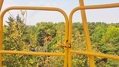 Areal slow motion footage of urban city made from ferris wheel. Concept