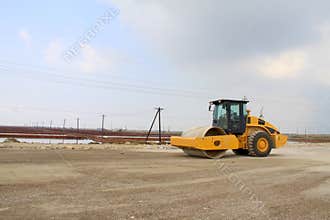 Roller in highway construction site