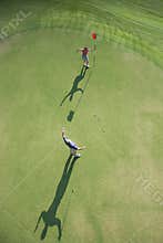 Aerial of golfers.