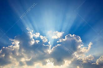 Blue sky & clouds with sun rays