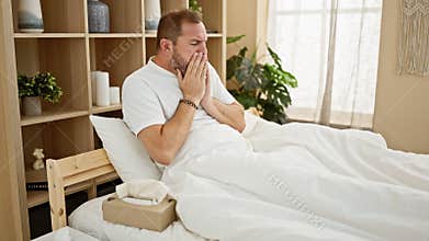 A middle-aged man with grey hair coughing in his bedroom, conveying illness or allergies at home