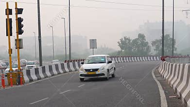 Ground-Level Gaze and Observing Delhi's Road Traffic from an Overbridge