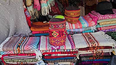 Cultural Treasures of Caps and Shawls Showcased at a Shop in Bir, Dharamshala