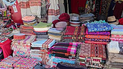Woolen Shawls and Caps Artfully Displayed in a Dharamshala Shop