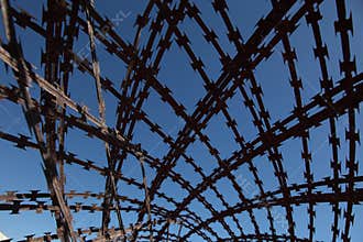 Criss crossed barbed wire