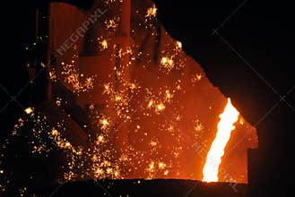 hot metal and sparks close up the photo was made ??in a steel plant located in ukraine