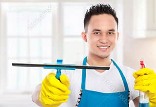 Man cleaning the house
