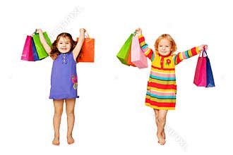 Kids shopping. Two little girls with their purchases and gifts.