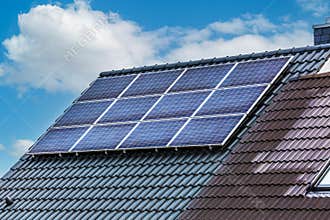 Photovoltaic panels on the roof of family house, solar panels