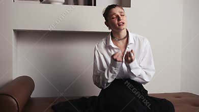 Woman, psychologist and crying on sofa with therapy, mental health or counseling for anxiety, depression and sad