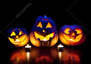 Halloween pumpkins glowing inside