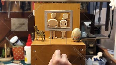 exhibition of paintings, funny wooden toy