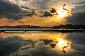 Reflections of a warm orange Sunset