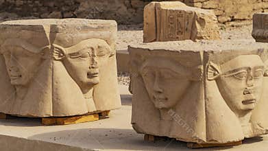 Ancient Egyptian hieroglyphs and bas-reliefs close-up in Dendera temple or Temple of Hathor. Egypt. Dendera Temple