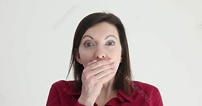 Portrait of woman expresses shock and amazement