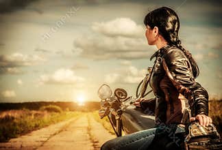 Biker girl on a motorcycle