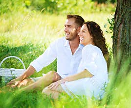 Young Couple in a Park. Picnic