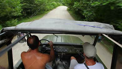 people riding off-road vehicle in forest, video