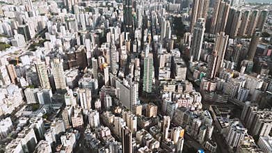Establishing shot of Hong Kong city, drone aerial cityscape high angle view. Skyscraper in business district