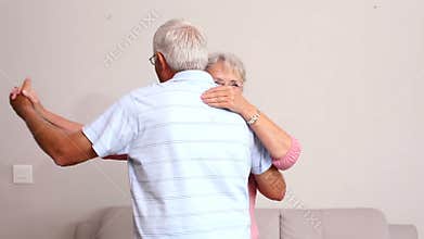 Senior couple dancing together