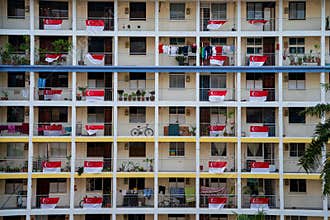 Singapore flags displayed on apartment balconies in celebration of National Day