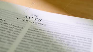 Extreme Close Up White Pages Turning in Modern Holy Bible Acts of Apostles