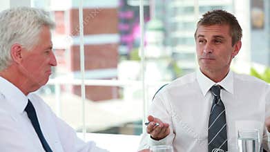 Businessmen talking together