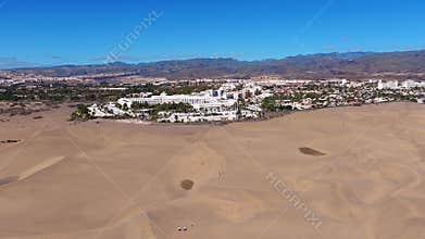 Aerial 4K of Maspalomas dunes and resorts on Gran Canaria