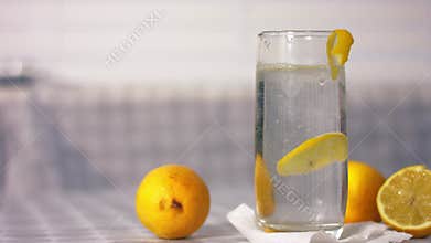 Serving of fizzy lemonade juice in a glass
