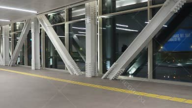 Istanbul, Turkiye - January 24, 2026: Modern Pedestrian Bridge Or Walkway. Large Glass Windows. Exposed Steel Structural Supports